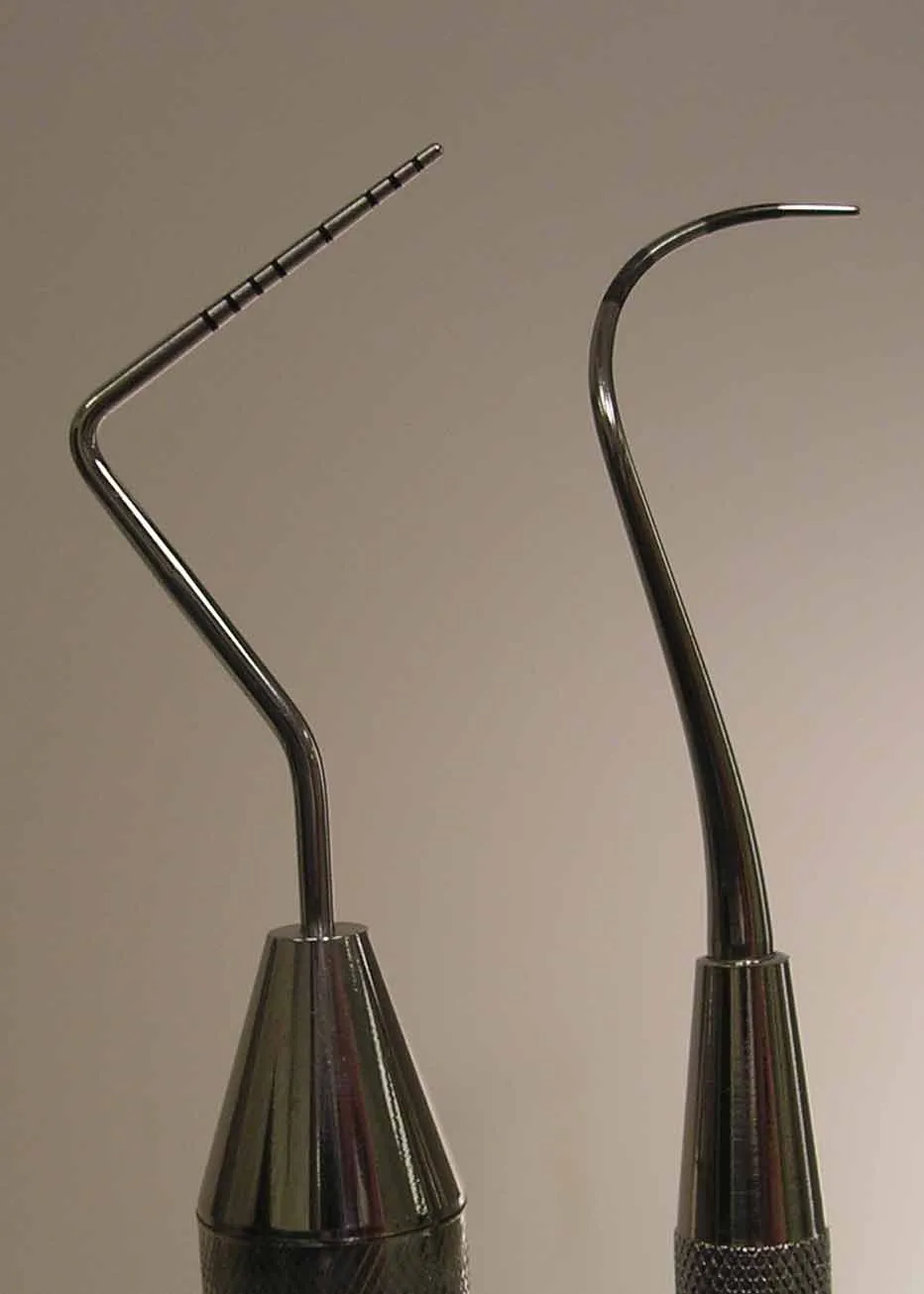 Close view of a straight Michigan O probe with Williams markings (left) beside a curved Nabers furcation probe (right)